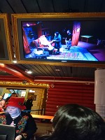サンタクロース村内の写真撮影の受付、会計まで